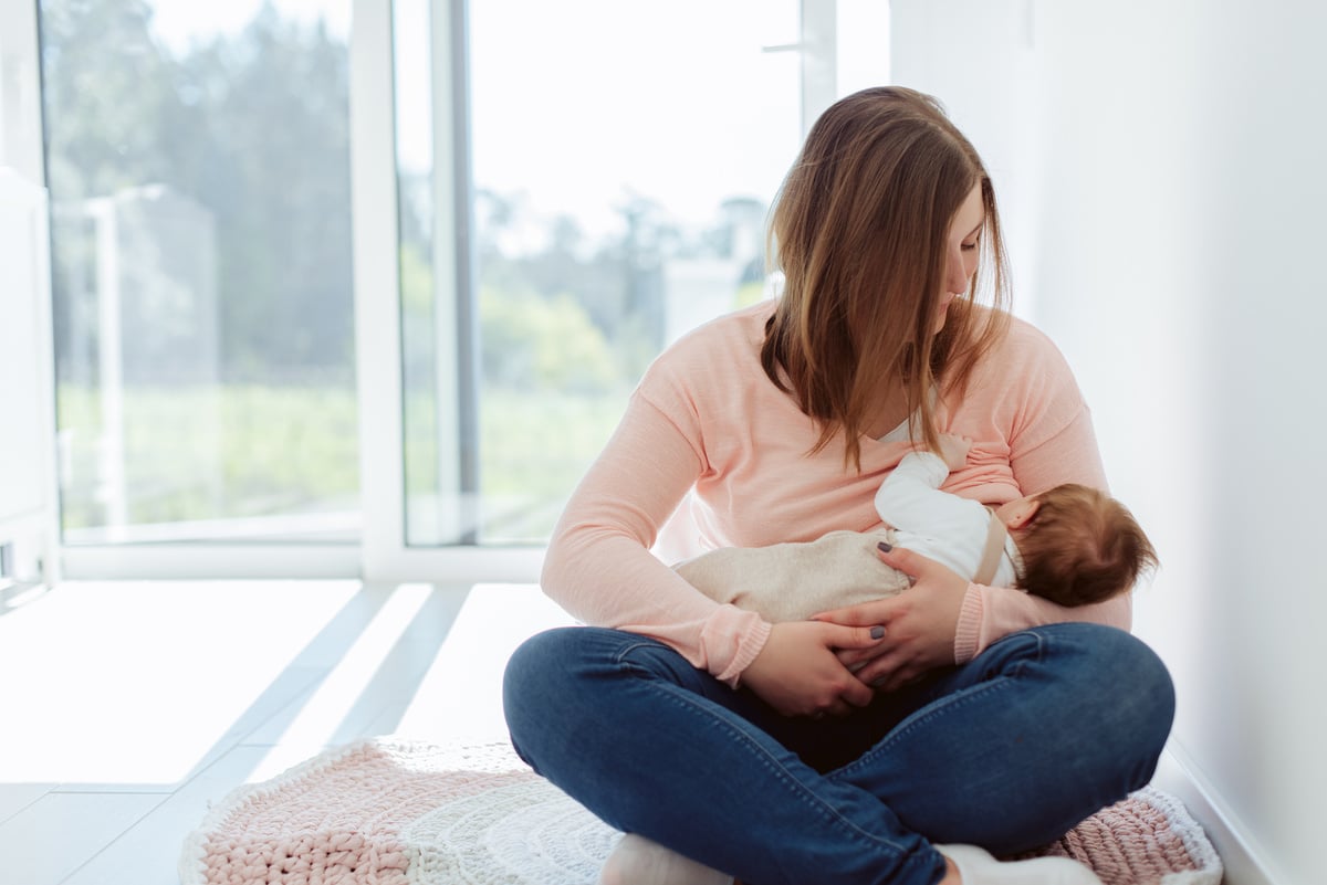 Mother Breastfeeding Newborn Baby